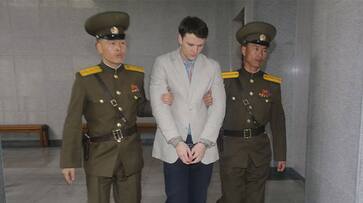 Otto Warmbier death usa student north korea torture coma steal poster