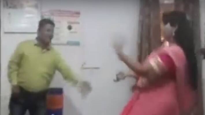 Officials caught dancing in government office Officials caught dancing in government office