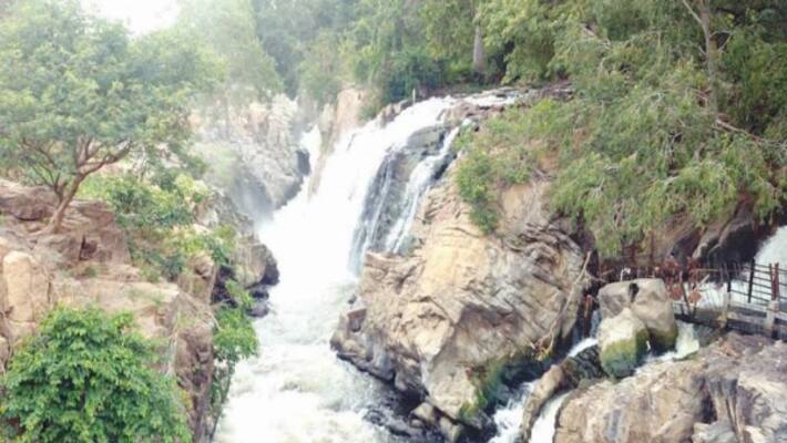 Increased water supply to hogenakkal tourists enjoying waterfalls Increased water supply to hogenakkal tourists enjoying waterfalls